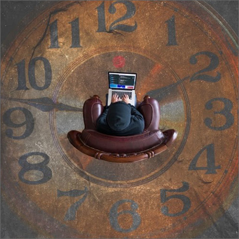 A person sitting on a chair in the middle of a clock.