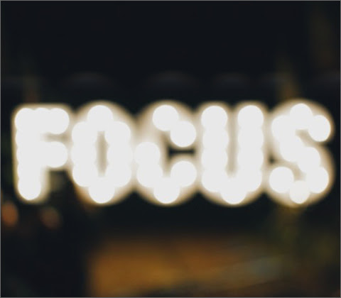 The word 'Focus' with a blurred effect.
